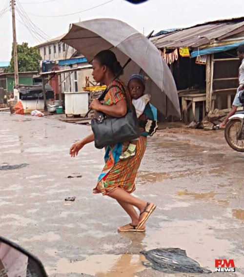 rain woman and child