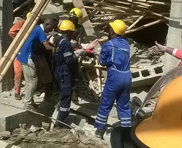 Rescue workers at the collapsed building