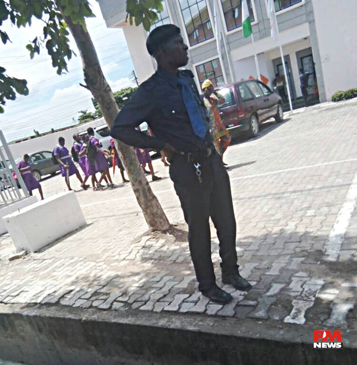 Security man on duty at Okota Isolo