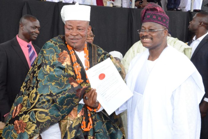 Onido of Ido, Oba Muritala Babalola receiving certificate of office from Governor Abiola Ajimobi (1)
