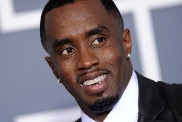 Diddy turns 'daddy/mommy' for his kids . News