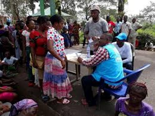 Nigerian officials of the United Nations High Commission for Refugees (UNHCR) enumerating the Cameroonian refugees