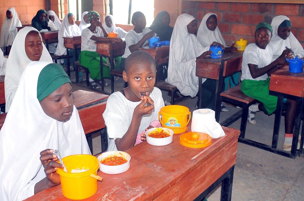 PUPILS-ENJOYING-FREE-LUNCH-AT-A-PRIMARY-SCHOOL-IN-KADUNA