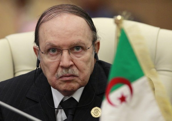 Algeria’s President Bouteflika listens to speech of Libya’s leader Gaddafi at the start of the third EU-Africa summit in Tripoli