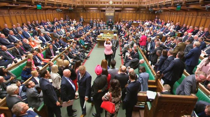 Members of Parliament for the Scottish National Party (SNP) walk out of the House of Commons during Prime Minister’s Questions after their leader Ian Blackford was asked to leave by the Speaker, in London