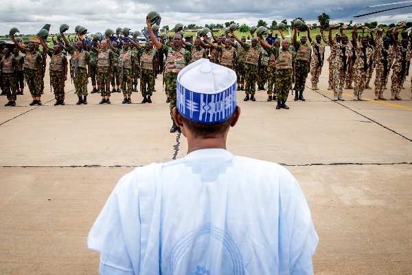 Buhari-with-troops-deployed-to-engage-bandits