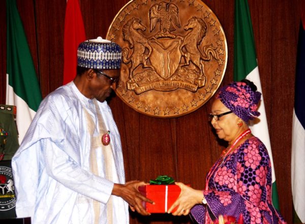 President-Buhari-receives-the-Tripartite-Committee-report-on-new-national-minimum-page-from-Ms-Ama-Pepple-e1541524464907