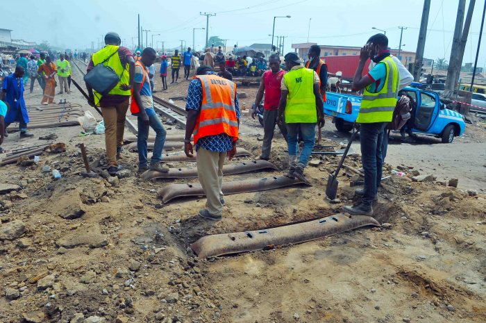 scene 5 Staff of the Nigeria Railway corporation repairing damaged tracks at Idi-Mangoro, Agege, Lagos