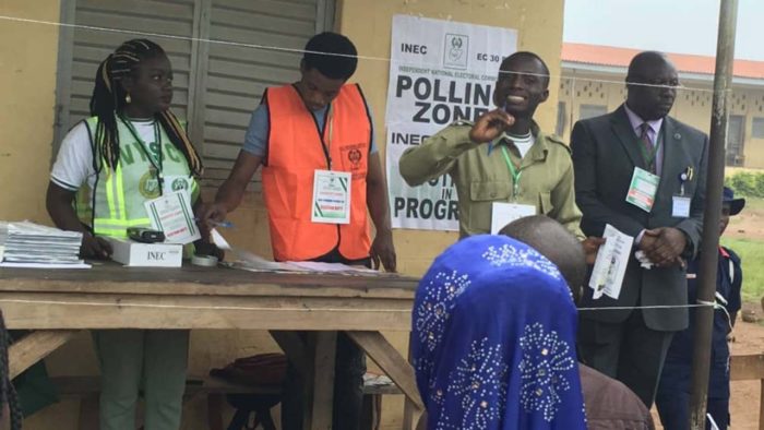 Corps-members-giving-instruction-to-voters-during-election-e1549753404350