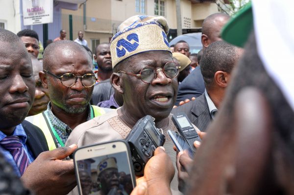 Asiwaju Ahmed Tinubu addressing newsmen shortly after cating his vote in a polling unit at Alausa, Ikeja earlier today (1)