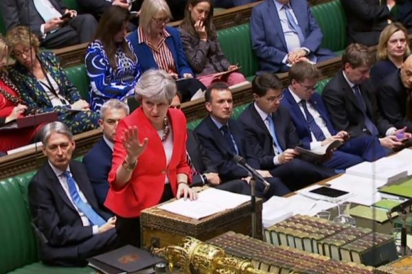 Theresa-May-with-other-British-MPs-in-parliament-on-Tuesday-night–e1552460640420