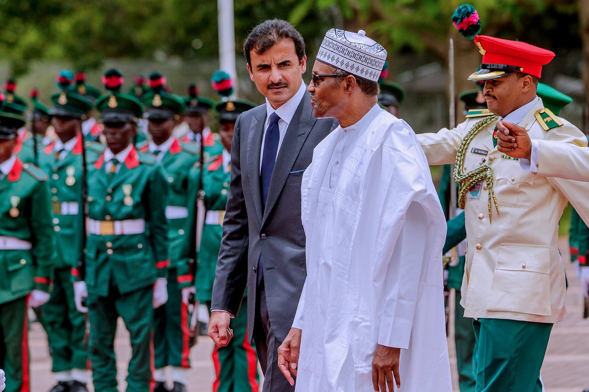 President Buhari with the Emir of Qatar.