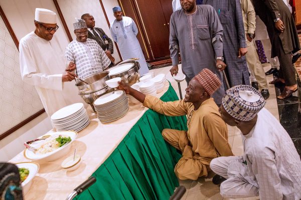 Buhari serves food for the physically challenged