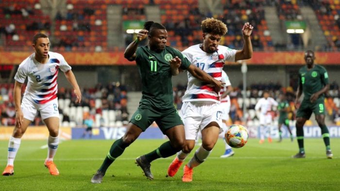 Flying-Eagles-player-and-U.S.-counterpart-chase-the-ball-during-their-match-1024×576