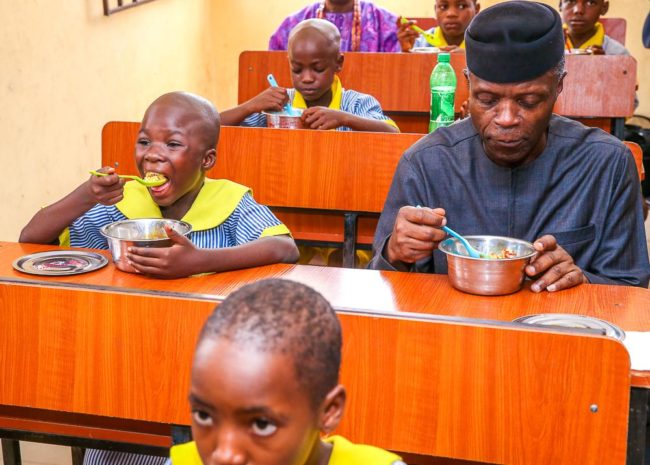 Vice-President-Yemi-Osinbajo-eating-with-pupils-of-St.-Michael’s-African-Primary-School-Ado-Ekiti.–e1557256794424