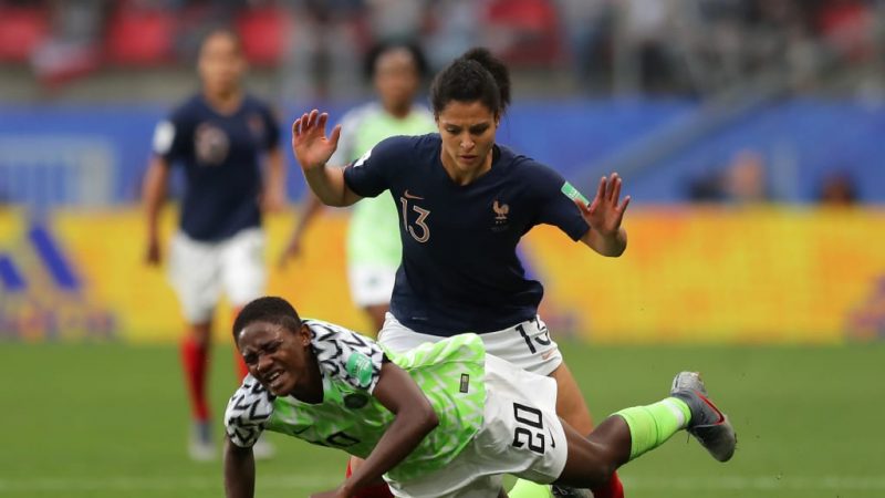 Gritty  match: A Super Falcons player and a French player