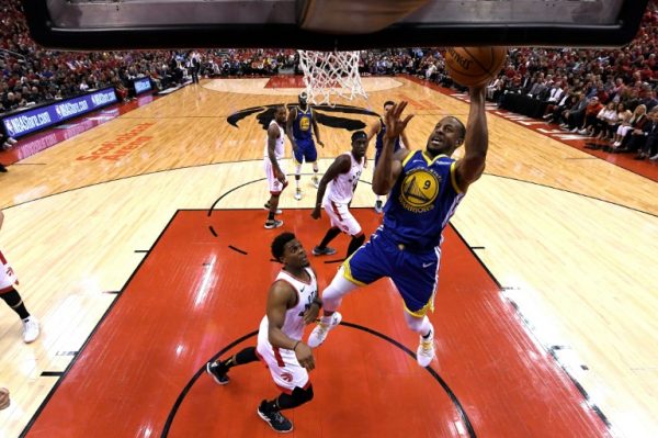 Draymond Green goes to the basket to give Golden State Warriors vital points to beat Raptors on the road