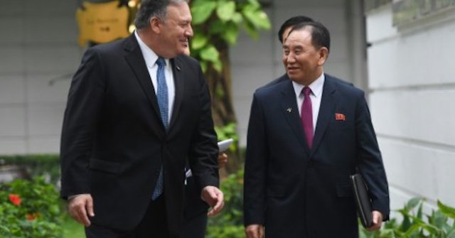 Kim Yong Chol, right, falsely reported to have been purged with Mike Pompeo