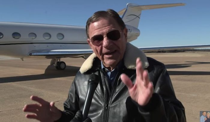 Pastor Kenneth Copeland with one of his jets