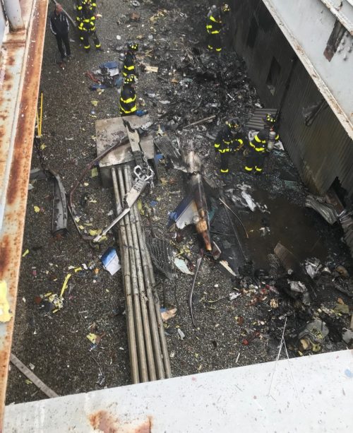 Remnants of the helicopter crash in New York roof top