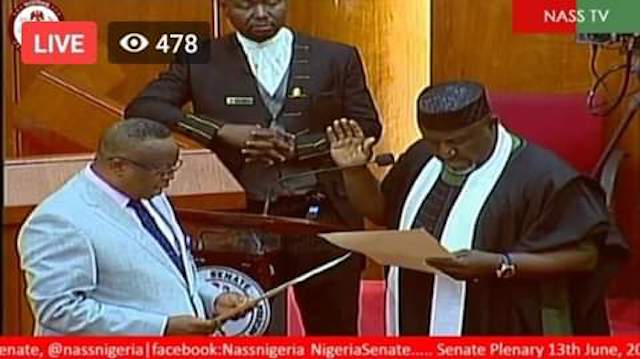 TV Image grab of Okorocha’s swearing in by Senate Clerk