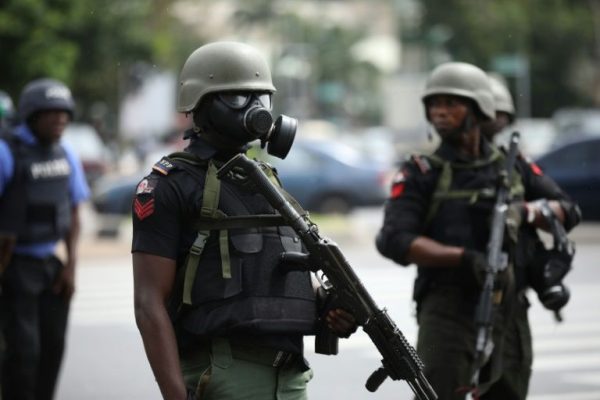 A Nigerian policeman in riot gear