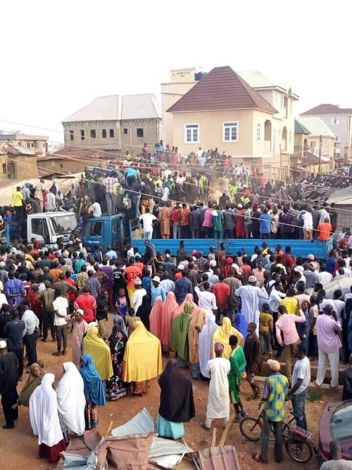 Crowd at the scene of the collapsed building in Jos