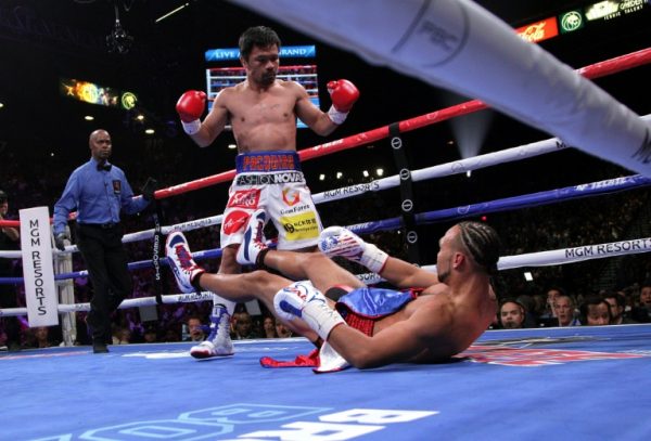 Pacquiao knocks down Thurman in the first round