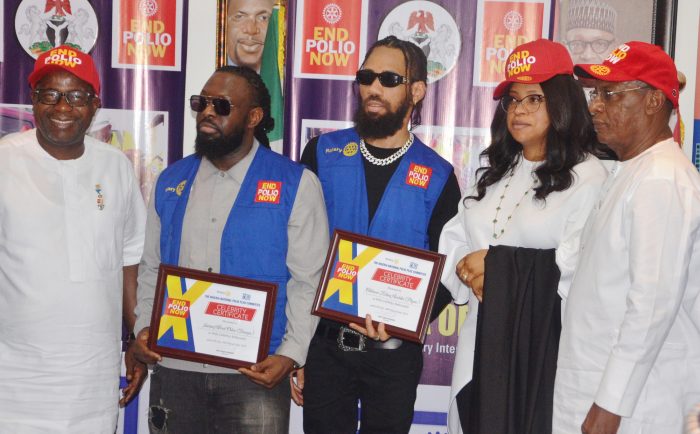 Pic.-3.-Decoration-of-Timaya-and-Phyno-as-polio-ambassadors-in-Abuja