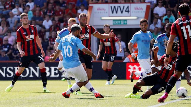 Sergio Aguero, middle sends the ball into Bournemouth’s net for the first goal