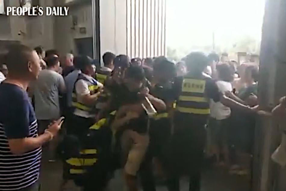 U.S. wholesale chain Costco opened in China on Tuesday, drawing large crowds of shoppers.