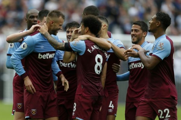 West Ham players celebrate victory over Man United