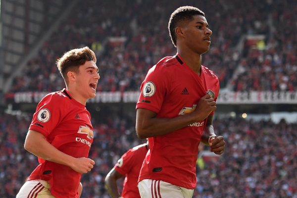 Marcus Rashford, right, gives Manchester United three points