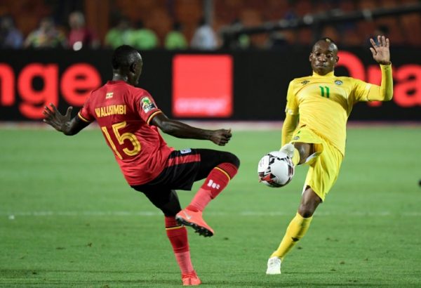 Zimbabwe star Khama Billiat, right, scores the stoppage time goal