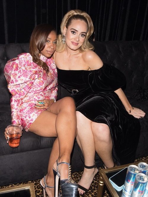 Adele simply gorgeous in a pose with a friend at the Drake party