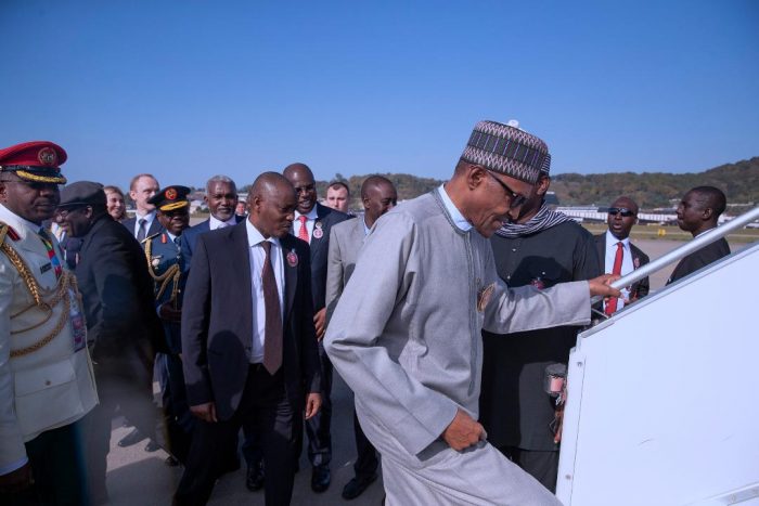 Buhari embarks on his plane