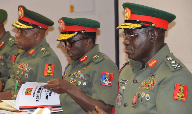 Pic. 31. From left: Chief of Logistics Nigerian Army, Maj.-Gen. J. I Unuigbe; Chief of Account and Budget, Nigerian Army, Maj.-Gen. A. R Bakare; and Chief of Army Staff, Lt.-Gen. Tukur Buratai, during their Budget Defence before the House of Representatives Committee on Army, at the National Assembly in Abuja on Thursday (24/10/19). 07102/24/10/2019/Hogan Bassey/NAN