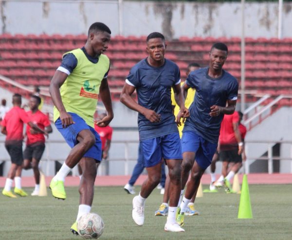 MFM FC players warming up for Rangers on Sunday