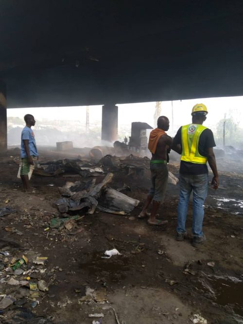 A representative of LASEMA, right under the bridge after the fire was put off