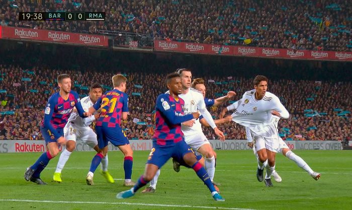 Action moments during the El Clasico at Camp Nou