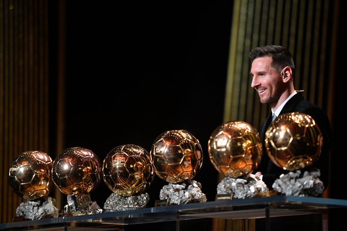 Messi poses with his record six Ballon D’Or