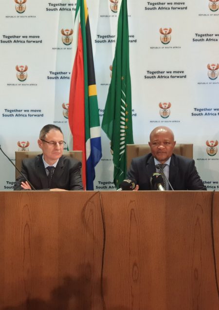 Minister Senzo Mchunu, right announcing the new ministerial handbook