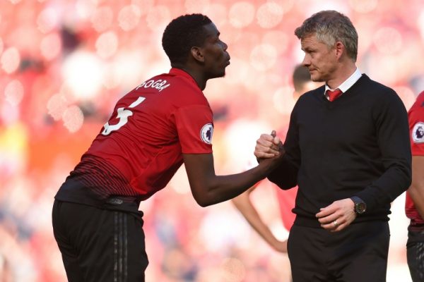 Pogba, left sidelined by injury and Coach Solskjaer