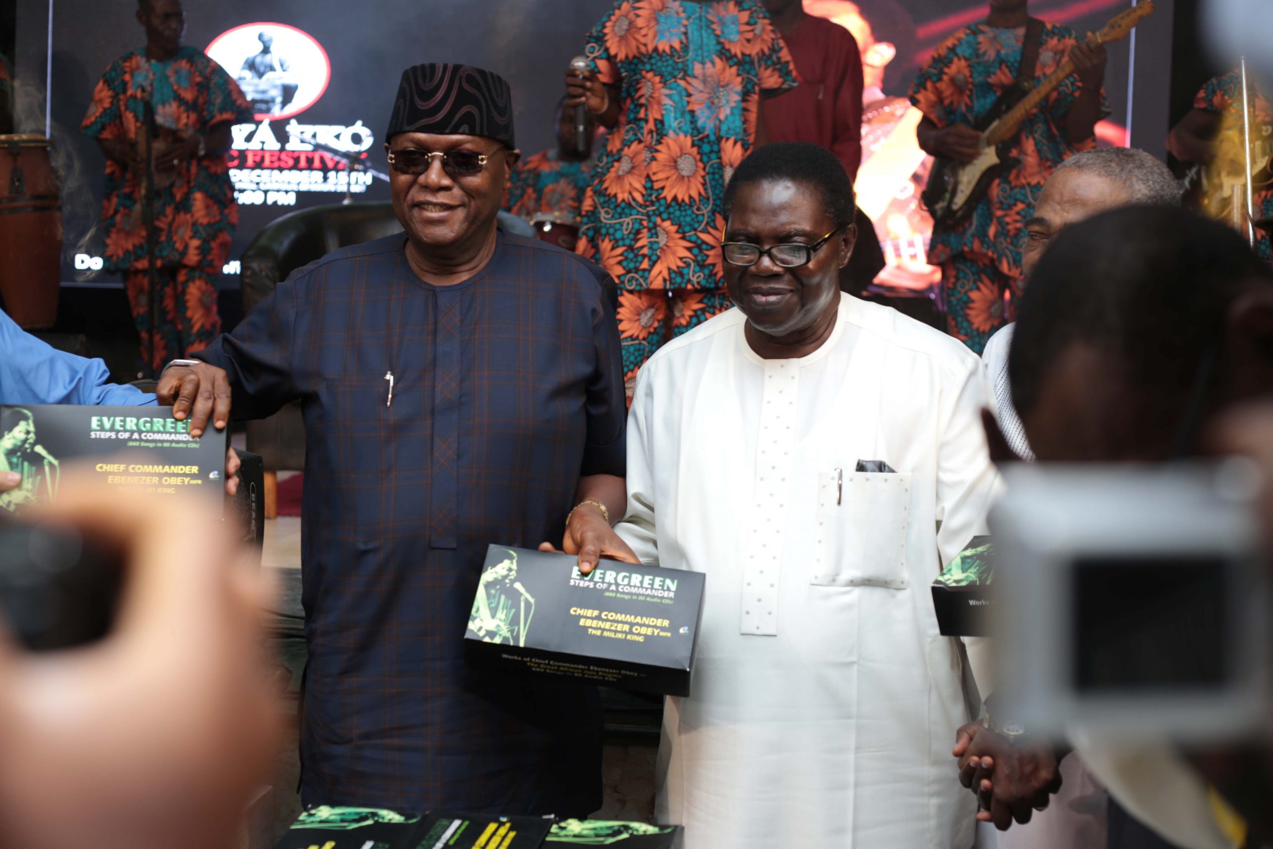 Prince Yemisi Shyllon and Chief Ebenezer Obey presenting the complete works of the latter to the public at the event. (1)