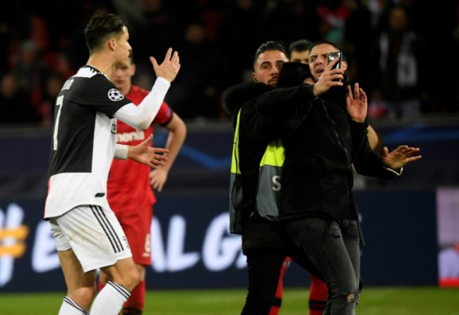 Ronaldo in a rage against the selfie-hunting pitch invader
