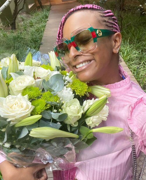 DJ Cuppy with the flowers she bought for herself in Cape Town South Africa a week ago