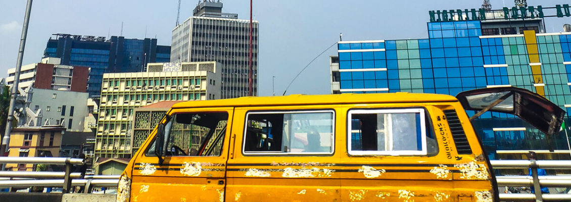 A danfo bus on a Lagos bridge