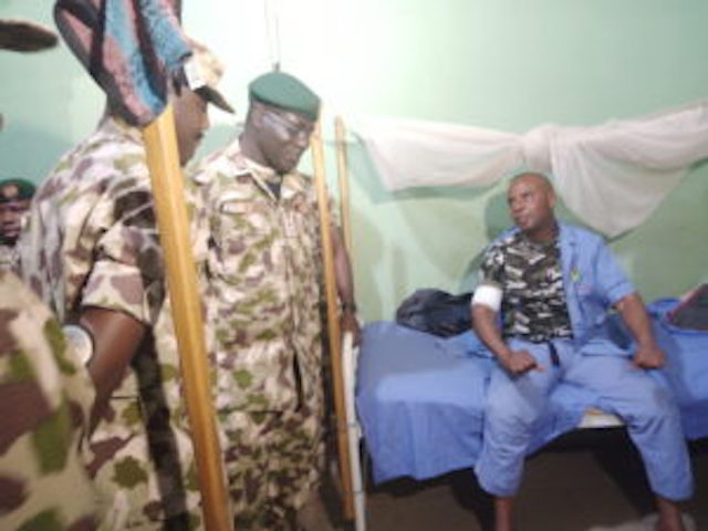 Buratai visits a soldier in hospital