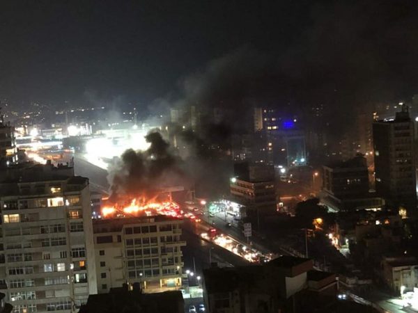 Fire set on the road by Lebanon’s protesters on Tuesday night