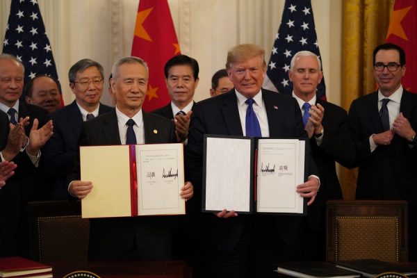 Trump and Chinese Vice Premier Liu He at the signing of the new trade deal in Washington Wednesday